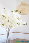 White Artificial Cherry Blossoms in Vase on kitchen table ShopWildThings.com White Artificial Cherry Blossoms in Vase on kitchen table ShopWildThings.com