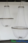 Extra large event chandeliers with pearl beads look elegant for a wedding or large venue event and party. Extra large event chandeliers with pearl beads look elegant for a wedding or large venue event and party.