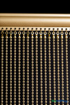 ShopWildThings Luxury Brass Gold Ball Chain Curtains in studio setting, dense metal bead design for upscale hospitality and retail