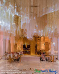 Create dazzling ceiling installation by layering Beaded, Metallic, and String Fringe Curtains by ShopWildThings.com
Need a custom color? Length? Our in-house fabrication team can make that happen!
Luxurious Wedding Reception – Grand Ceiling Decor Installation