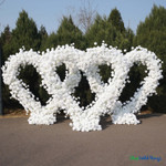White heart shaped floral arch cluster premium silk rose wedding backdrop large event installation ShopWildThings.com