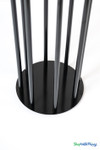 Close-up of round black metal base on Black Stem Cluster candelabra with slim vertical stems from ShopWildThings.com