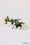 Three color options of 12-piece silk rose bud bundles in peach, white, and ivory for bridal bouquets and centerpieces