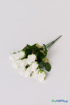 Ivory silk rose bud bundle lying flat to show 12 artificial rose sprays, bendable stems, and lifelike green leaves