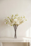 40" Faux Cream White Cherry Blossom Branch from ShopWildThings.com arranged in a clear glass vase for centerpieces and spring event styling