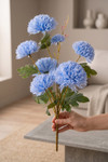 Blue Faux Chrysanthemum Bouquet – 27" Faux Floral Stem (8 Heads) held by hand to show single stem design, flexible branches, and lifelike scale, ShopWildThings.com