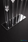 Close-up of the Isolde rectangular acrylic base with interchangeable stem placement ports allowing custom staggered candelabra configurations.