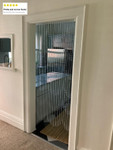 Hang Raindrops Beaded Curtains in a Doorway to Create Ambiance, Add Color and to Separate Areas Hang Raindrops Beaded Curtains in a Doorway to Create Ambiance, Add Color and to Separate Areas