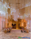 Create dazzling ceiling installation by layering Beaded, Metallic, and String Fringe Curtains by ShopWildThings.com
Need a custom color? Length? Our in-house fabrication team can make that happen!
Luxurious Wedding Reception – Grand Ceiling Decor Installation