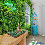 Paradise Artificial Greenery Wall Panels by ShopWildThings.com are more than just beautiful—they're tough! Made with UV-treated materials, they're built to last both indoors and outdoors, so you can create a statement wall that will stay vibrant and lush for years to come.
Tropical Airbnb Vacation Rental Property Interior Design