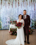 From Ceiling to Backdrop, Fringe String Curtains by ShopWildThings.com Can Do It All! Create a stunning backdrop or add a touch of magic to your ceiling. Choose from our ready-to-go colors or customize them to match your event perfectly. Need Fire Rated Decor? We offer FR String Curtains as Well!

White and Red Wedding Reception Decor with String Fringe Curtains Ceiling Decor