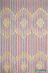 “Augusta Chestnut” wood beaded curtain with red and natural wood beads, geometric design, scalloped bottom, and black header rail, ShopWildThings.com