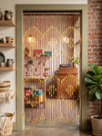 “Augusta Chestnut” wood beaded curtain with red and natural wood beads, geometric design, scalloped bottom, and black header rail, ShopWildThings.com