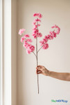 ShopWildThings Artificial Silk Dogwood Branch 36 inch pink branch held in hand for size reference