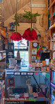 Fantastic Retail Book Shop Decor with Fantasy Jumbo Red Rose Ceiling Installation - Oversized Red Roses by ShopWildThings.com Fantastic Retail Book Shop Decor with Fantasy Jumbo Red Rose Ceiling Installation - Oversized Red Roses by ShopWildThings.com