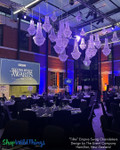 Glamorous Awards Night Lighting with Swag Chandeliers
For unforgettable gala decor, ShopWildThings' Tillie Empire Swag Chandeliers offer dramatic height, shimmer, and texture. Their ornate metal frame and acrylic crystal beads make them a standout choice for large-scale luxury events.
