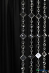 Tall 12 foot crystal beaded curtain with hand-strung faceted acrylic strands, ideal for wedding backdrops and stage installations