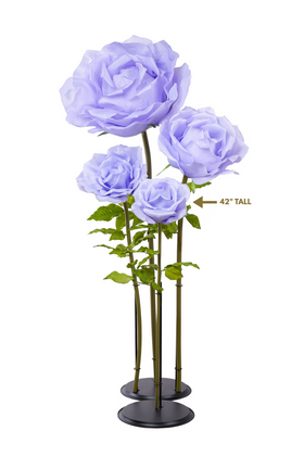 Product photo of oversized light purple silk rose blooms, tall decorative flower prop with removable stem and sturdy base from ShopWildThings.com.