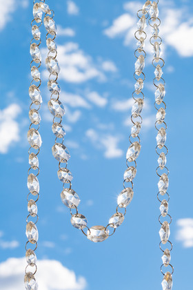 30 foot crystal clear acrylic beaded garland with alternating 1/2 inch and 3/4 inch faceted octagon beads, premium event decor for weddings and centerpieces by ShopWildThings.com