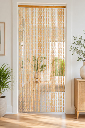 “Oakland Natural” 35 x 78-inch Heavyweight Wood Beaded Curtain installed in a bright modern doorway as a natural room divider – ShopWildThings.com