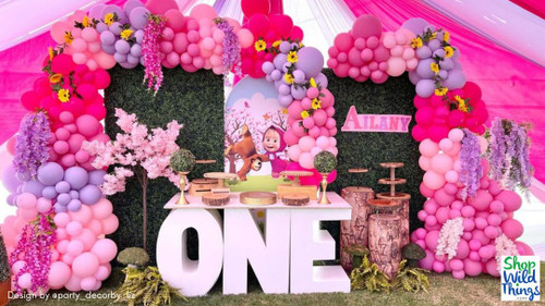 Artificial Flowering Trees by ShopWildThings.com are a fun way to add height, texture, and dimension to any party! Available in a wide range of colors, styles, and sizes from tabletop to sweeping archways. 

Girls First Birthday Pink and Purple Birthday Party Decor – Balloons, Flowering Trees, Tent Decor