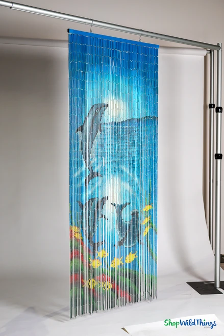“Dolphin Family” hand-painted bamboo curtain with colorful ocean scene and three dolphins on white background, 35.5" wide x 78" long, ShopWildThings.com