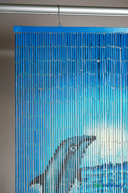 “Dolphin Family” hand-painted bamboo curtain with colorful ocean scene and three dolphins on white background, 35.5" wide x 78" long, ShopWildThings.com