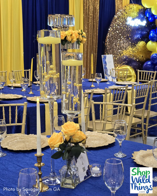 Luxurious Yellow Rose Centerpiece Using Deluxe Queen Rose Bouquets by ShopWildThings.com! These rose bushes are available in over 20 unique and hard to find colors and feature 10 large artificial rose heads! Perfect for creating the floral centerpiece of your dreams.