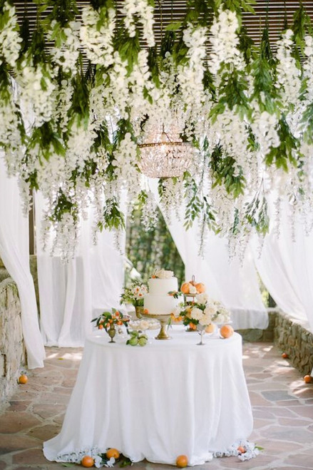 Use Draping Flower Garlands and Greenery Vines To Create Affordable, Hanging Floral Chandeliers by ShopWildThings.com
