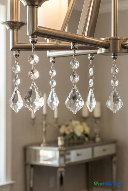 Magnetic crystal pendant decor jewelry set showing six clear faceted acrylic drops magnetically hanging from metal lighting fixture, chandelier and lamp styling accessories – ShopWildThings.com