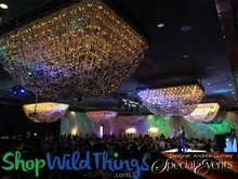 Strands of PVC Discs from ShopWildThings Beaded Curtains Can be Used to Create Giant Chandeliers