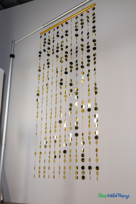 Hanging Metallic Gold PVC Discs and Clear Acrylic Crystals Make a Perfect Photo or Event Backdrop | ShopWildThings.com
