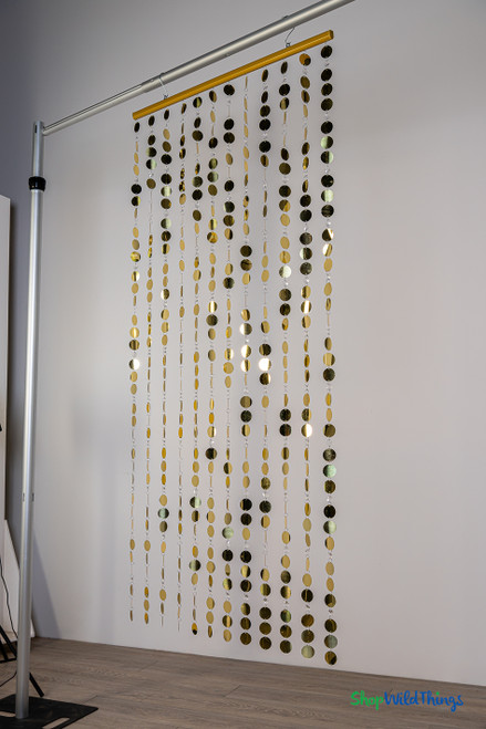 Hanging Metallic Gold PVC Discs and Clear Acrylic Crystals Make a Perfect Photo or Event Backdrop | ShopWildThings.com