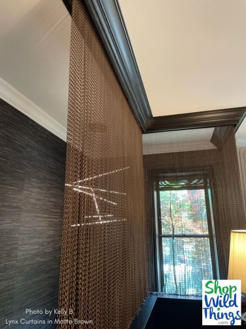 Fabulous Home Ceiling Decor with Lynx Metal Chain Curtains by ShopWildThings.com

Lynx Aluminum Chain Curtains by ShopWildThings.com are a perfect balance of sophistication and elevation for any space, residential or commercial. Available in 7 ready to ship colors, and an endless number of colors and sizes with our custom fabrication – add these metal chain curtains to your design for a transformative experience.
Pictured here are “Matte Brown” Lynx Aluminum Chain Curtains by ShopWildThings.com