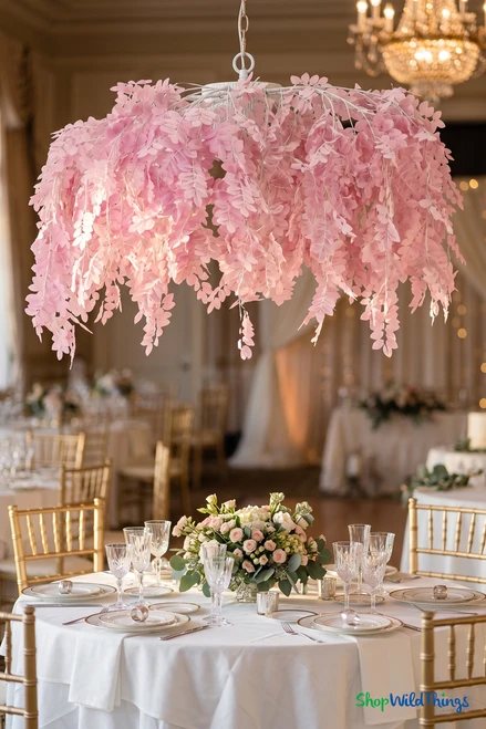 48 inch pink acacia leaf hanging floral chandelier canopy over round table with white linens and floral centerpiece, ShopWildThings.com