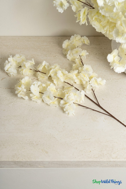 ShopWildThings Pure White Artificial Silk Dogwood Branch 36 inch pale yellow crème version in ceramic vase realistic floral arrangement