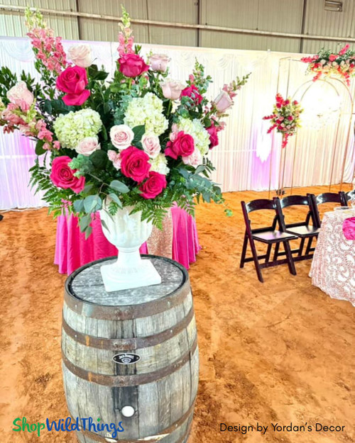 Pink & Gold Quinceañera Decor with Silk Florals from ShopWildThings
This vibrant quinceañera theme featured layers of hot pink, magenta, and blush artificial silk roses from ShopWildThings. Touches of gold and crystal added that signature glam effect, with one of our artificial flowering trees making a stunning appearance at the dessert table. Perfect inspiration for a luxe pink-on-pink celebration!