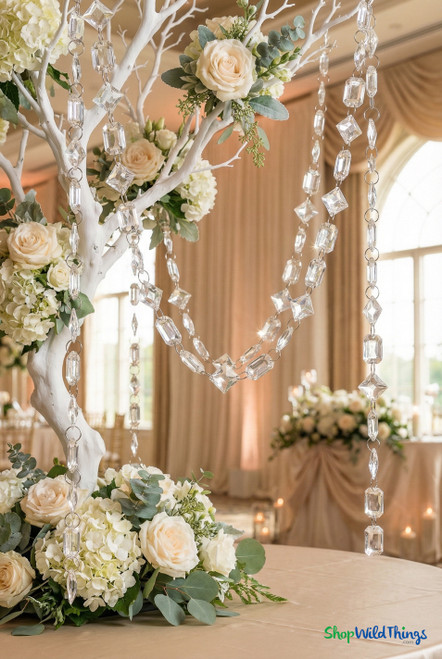 Luxury 30 foot clear acrylic crystal bead garland for chandeliers, manzanita trees, and wedding reception decor from ShopWildThings.com