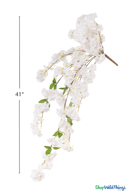41" White Cascading "Spring Blossom" Spray – Extra-Full Silk Floral Waterfall from ShopWildThings.com displayed on a white background with a 41-inch size guide, showing the full cascading shape, white silk blossoms, bendable brown stems, and green leaves.