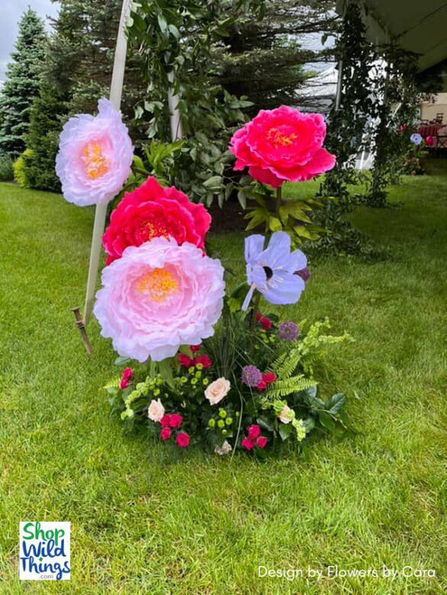 Whimsical Entrance Decor with Sheer Jumbo Florals
Create a dreamy first impression with Sheer Ethereal Voile Flowers from ShopWildThings. These oversized blooms have a soft, translucent texture that adds whimsy and movement to tented walkways, garden parties, or wedding ceremonies. Choose from peonies, coreopsis, daisies, and more—available in multiple colors and sizes for fully custom event styling.