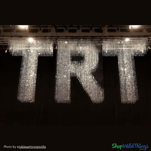 Create show stopping ceiling decor with Beaded Curtains by ShopWildThings.com! 100’s of ready to ship sizes and styles, plus our in-house custom fabrication team can make anything you dream up!
Beaded Curtains are great, high impact choices for galas, events, theater, and stage sets.
Theater Stage Set with Dazzling Beaded Curtains