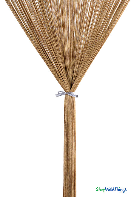 “Detailed view of tied Honey Gold String Curtain. Close-up of silky strands and tied knot showing texture and thickness of high-density fringe curtain used for backdrops and displays.”