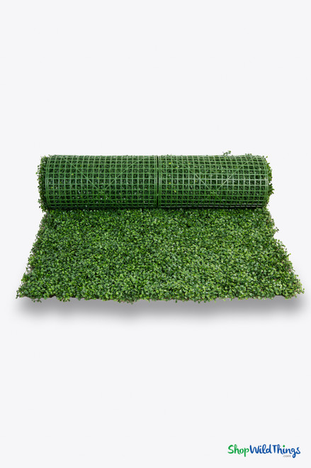 ShopWildThings Artificial Boxwood Backdrop Panel – Close Up Showing Flexible Plastic Grid Backing and Dense Realistic Green Leaves