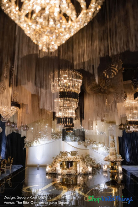 String Curtains are super popular with designers in 2024! Completely customizable to any color or length you need and can also be created as matching String Columns and Chandeliers, plus it’s possible to get them Fire Rated as well. The team at ShopWildThings.com has many styles in stock and ready to ship from Arizona but can also fabricate incredible designs just for you!

Gold, Champagne, Black
2024 Wedding Decor Trends – ShopWildThings.com – Since 1989

Custom String Fringe Curtain Ceiling Installation – Glam Wedding Ideas