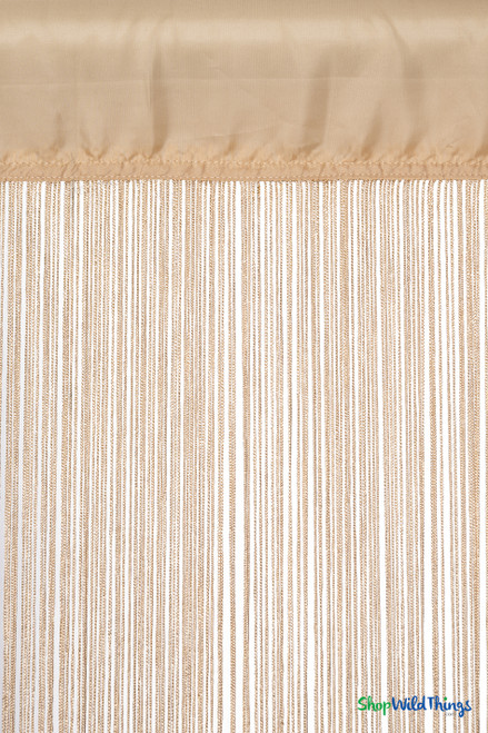 Close-up detail of Golden Blonde String Curtain rod pocket and fire-rated silky strands, showing texture and craftsmanship.