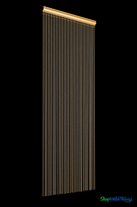 Brass gold 6mm metal ball chain curtains installed as luxury room dividers in a modern interior, fire rated decor from ShopWildThings.com