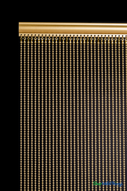 Studio close-up of ShopWildThings Brass Gold Ball Chain Curtain highlighting 1/2-inch on-center bead spacing