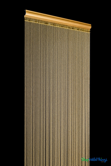 Studio detail of ShopWildThings Brass Gold Ball Chain Beaded Curtain, high-density gold metal strands with luxury architectural finish