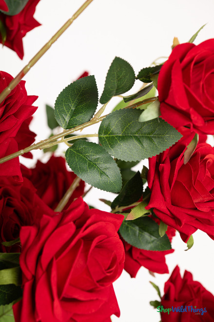 Artificial rose tree leaf and stem detail featuring lifelike greenery, natural veining, and flexible branches