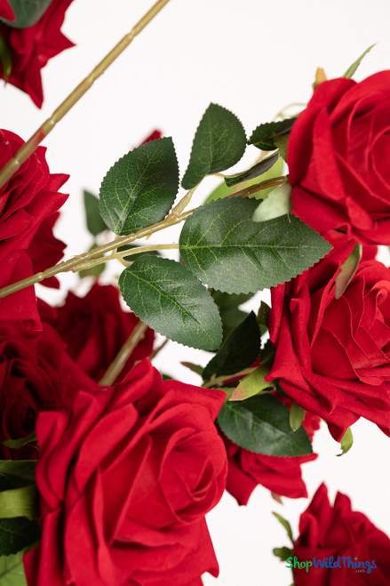 Artificial rose tree leaf and stem detail featuring lifelike greenery, natural veining, and flexible branches